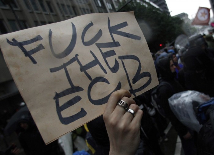 protester-holds-placard-during-anti-capitalist-blockupy-demonstration